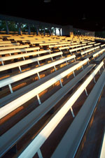 Empty grandstand at sunset